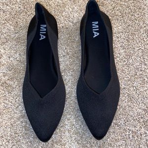 Black MIA flats